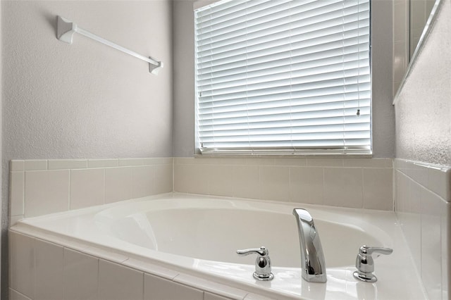 2885 Lafayette Trace Dr, Saint Cloud, FL 34772 - full bath with a bath and a textured wall