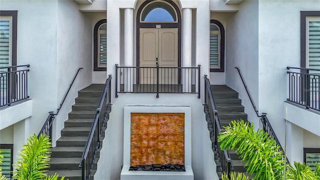 1329 Jumana Loop, Apollo Beach, FL 33572 - view of exterior entry featuring stucco siding