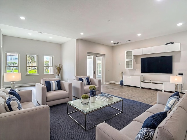 1329 Jumana Loop, Apollo Beach, FL 33572 - living area featuring wood finished floors and recessed lighting
