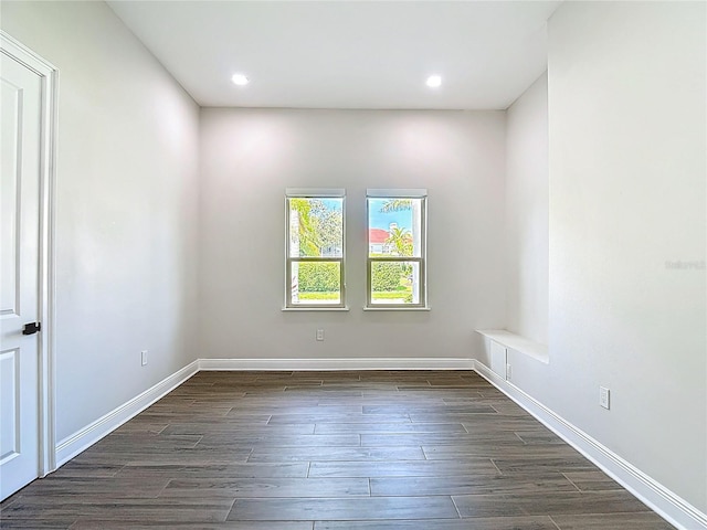 1329 Jumana Loop, Apollo Beach, FL 33572 - empty room featuring dark wood-style floors and recessed lighting