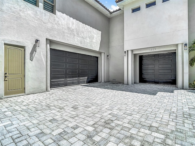 1329 Jumana Loop, Apollo Beach, FL 33572 - garage with decorative driveway