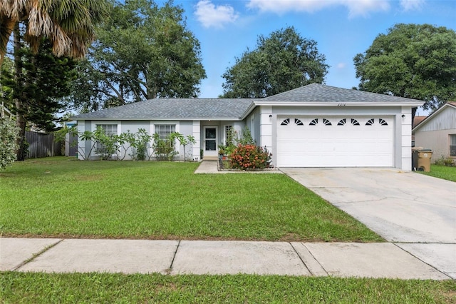 2212 Clementine Trl, Clermont, FL 34714 - single story home with a garage, driveway, stucco siding, and roof with shingles