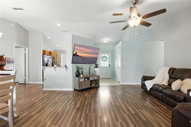 2212 Clementine Trl, Clermont, FL 34714 - living area with lofted ceiling, a ceiling fan, and wood finished floors