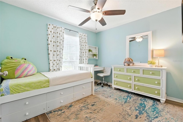 2212 Clementine Trl, Clermont, FL 34714 - bedroom with a ceiling fan and an office area
