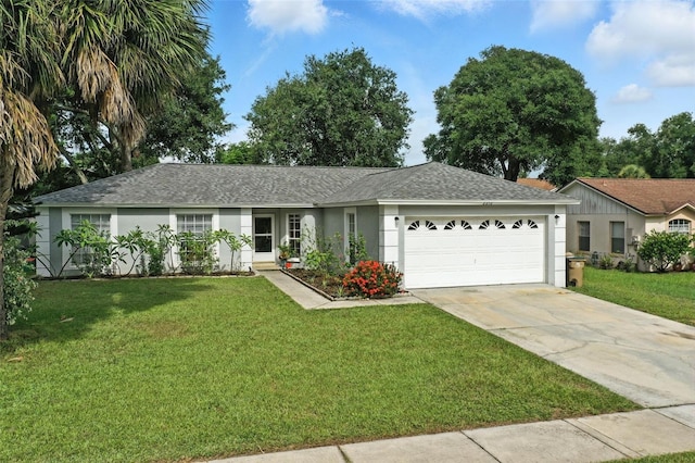 2212 Clementine Trl, Clermont, FL 34714 - single story home featuring stucco siding, a garage, driveway, and a front lawn