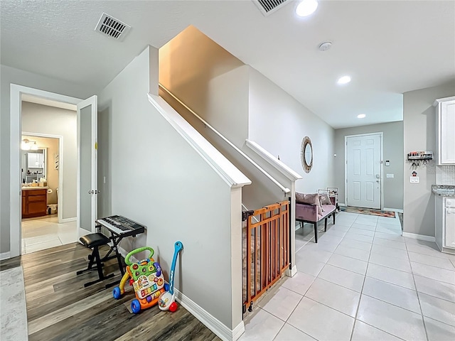 1808 Regal River Cir, Ocoee, FL 34761 - hallway featuring recessed lighting, stairs, and light wood-style flooring