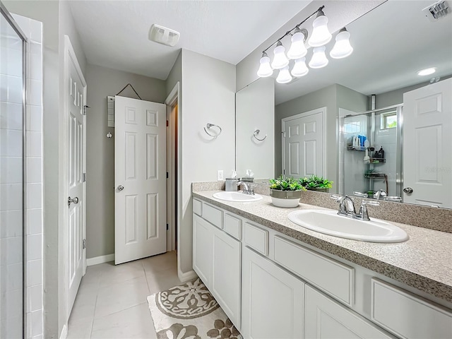 1808 Regal River Cir, Ocoee, FL 34761 - bathroom featuring double vanity, tile patterned flooring, and a shower stall