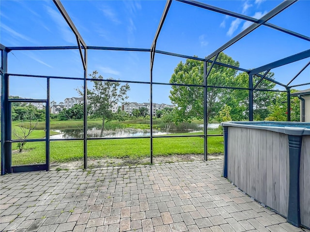 1808 Regal River Cir, Ocoee, FL 34761 - view of patio featuring a lanai and a water view