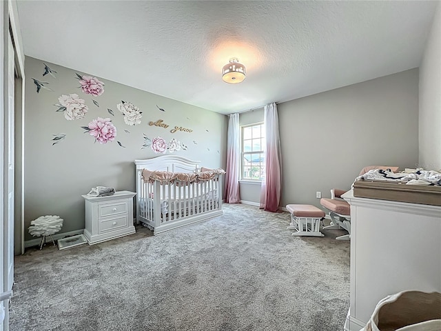 1808 Regal River Cir, Ocoee, FL 34761 - bedroom featuring carpet floors, a crib, and a textured ceiling