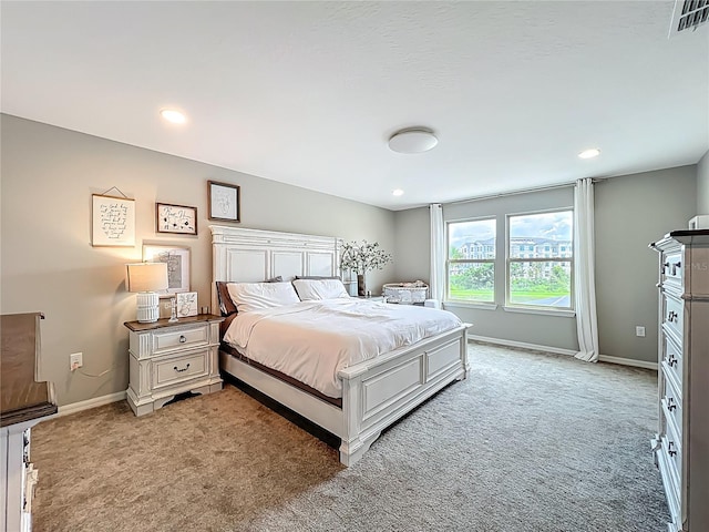 1808 Regal River Cir, Ocoee, FL 34761 - bedroom featuring light carpet and recessed lighting