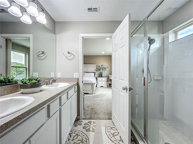 1808 Regal River Cir, Ocoee, FL 34761 - bathroom with ensuite bathroom, a shower stall, double vanity, and tile patterned flooring