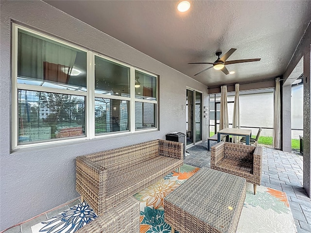 1808 Regal River Cir, Ocoee, FL 34761 - sunroom / solarium featuring ceiling fan and outdoor lounge area