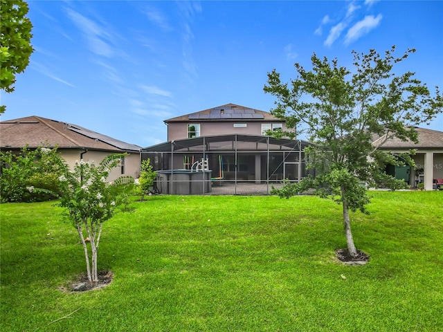 1808 Regal River Cir, Ocoee, FL 34761 - view of green lawn with a lanai