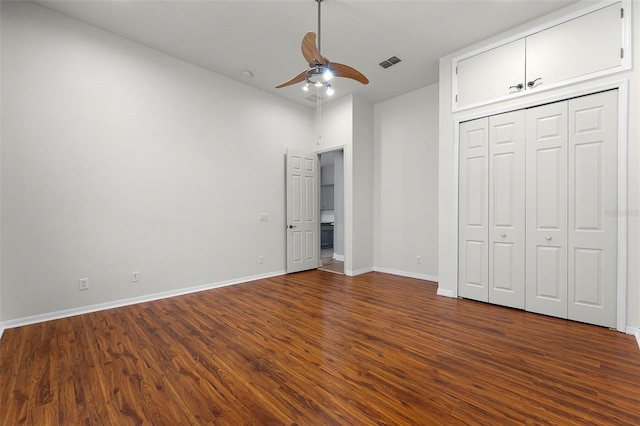 2495 Squaw Crk, Clermont, FL 34711 - unfurnished bedroom with dark wood-style floors and a ceiling fan