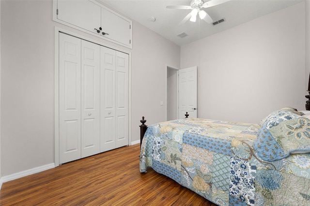 2495 Squaw Crk, Clermont, FL 34711 - bedroom with wood finished floors, a closet, and a ceiling fan