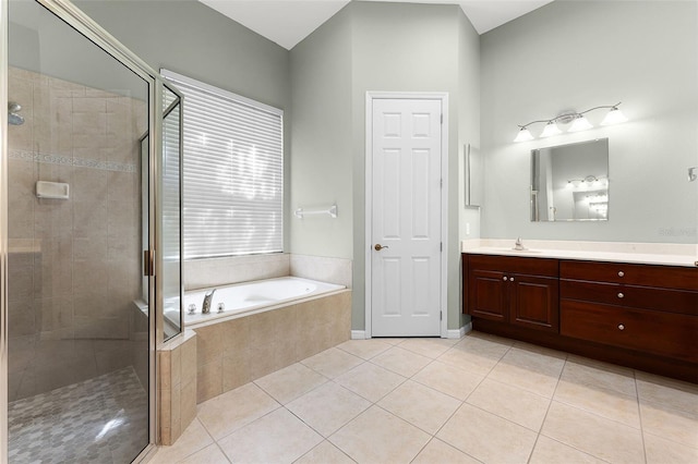 2495 Squaw Crk, Clermont, FL 34711 - bathroom with a stall shower, a bath, vanity, and tile patterned flooring