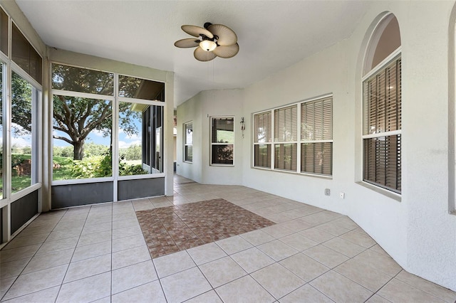 2495 Squaw Crk, Clermont, FL 34711 - unfurnished sunroom featuring tile patterned flooring