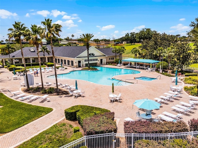 2495 Squaw Crk, Clermont, FL 34711 - community pool featuring a patio