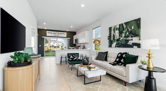 3045 Skyline Loop, Kissimmee, FL 34758 - living room with recessed lighting and light tile patterned floors