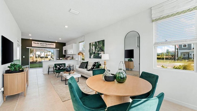 3045 Skyline Loop, Kissimmee, FL 34758 - dining space featuring light tile patterned floors and recessed lighting