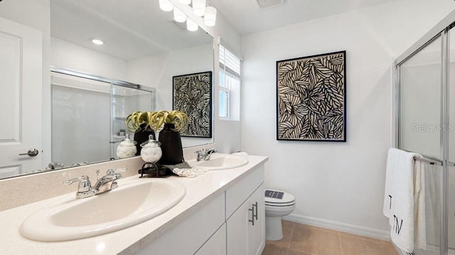 3045 Skyline Loop, Kissimmee, FL 34758 - full bathroom with double vanity, a stall shower, and tile patterned flooring