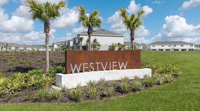 3045 Skyline Loop, Kissimmee, FL 34758 - community sign with a yard and a residential view