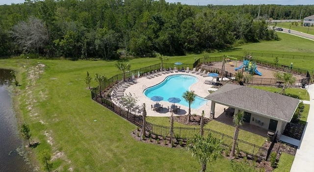 3045 Skyline Loop, Kissimmee, FL 34758 - community pool with a patio area