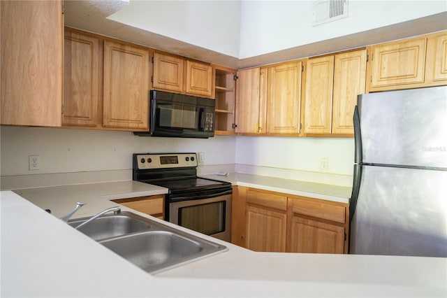 13037 Mulberry Park Dr Unit 5211, Orlando, FL 32821 - kitchen with stainless steel appliances, light countertops, and open shelves