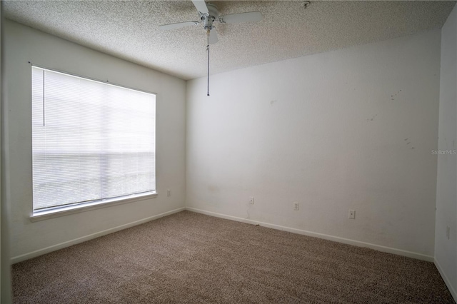 13037 Mulberry Park Dr Unit 5211, Orlando, FL 32821 - unfurnished room featuring a textured ceiling, carpet flooring, and ceiling fan