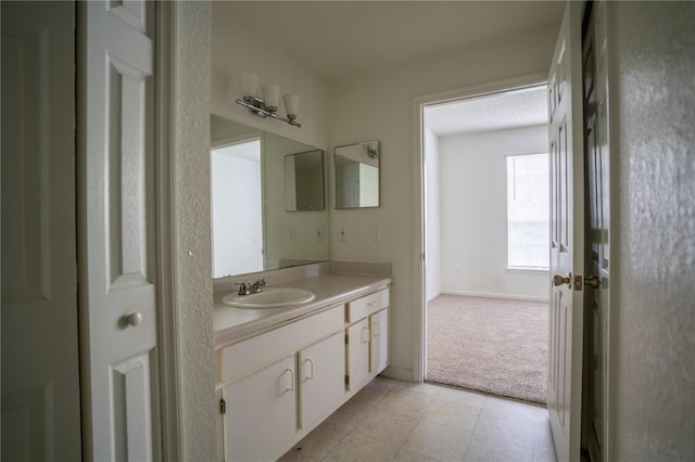 13037 Mulberry Park Dr Unit 5211, Orlando, FL 32821 - bathroom featuring vanity and tile patterned flooring