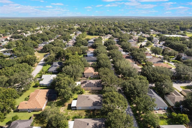 988 Vanderbilt Dr, Eustis, FL 32726 - aerial perspective of suburban area featuring a forest