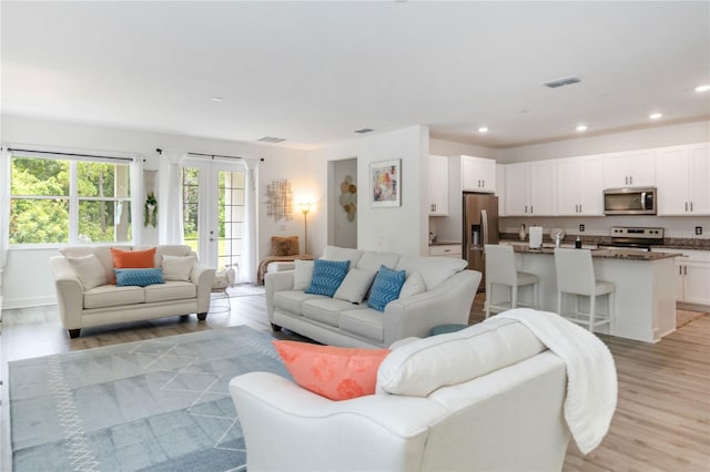 16400 Winding Preserve Cir, Clermont, FL 34714 - living area featuring light wood-style floors and recessed lighting
