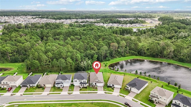 16400 Winding Preserve Cir, Clermont, FL 34714 - aerial view of residential area featuring a heavily wooded area and a nearby body of water