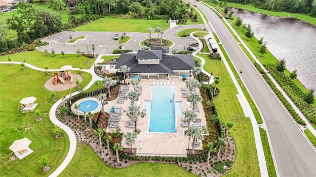 16400 Winding Preserve Cir, Clermont, FL 34714 - drone / aerial view of a pool and a large body of water