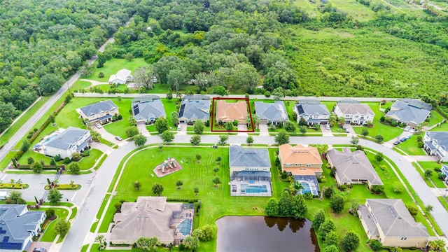 1208 Fieldstone Cir, Oviedo, FL 32765 - aerial view of residential area featuring property parcel outlined and a forest