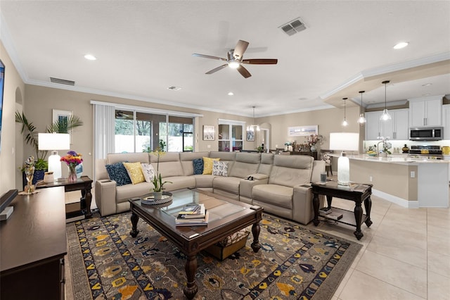 1208 Fieldstone Cir, Oviedo, FL 32765 - living area with a ceiling fan, light tile patterned flooring, recessed lighting, and ornamental molding