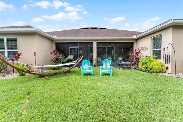 1208 Fieldstone Cir, Oviedo, FL 32765 - rear view of property featuring stucco siding, a sunroom, a ceiling fan, and a yard