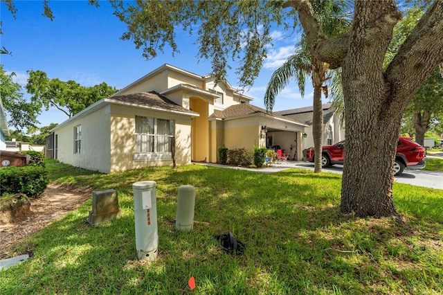 1305 Rebecca Dr, Haines City, FL 33844 - view of front of home with a front yard and stucco siding