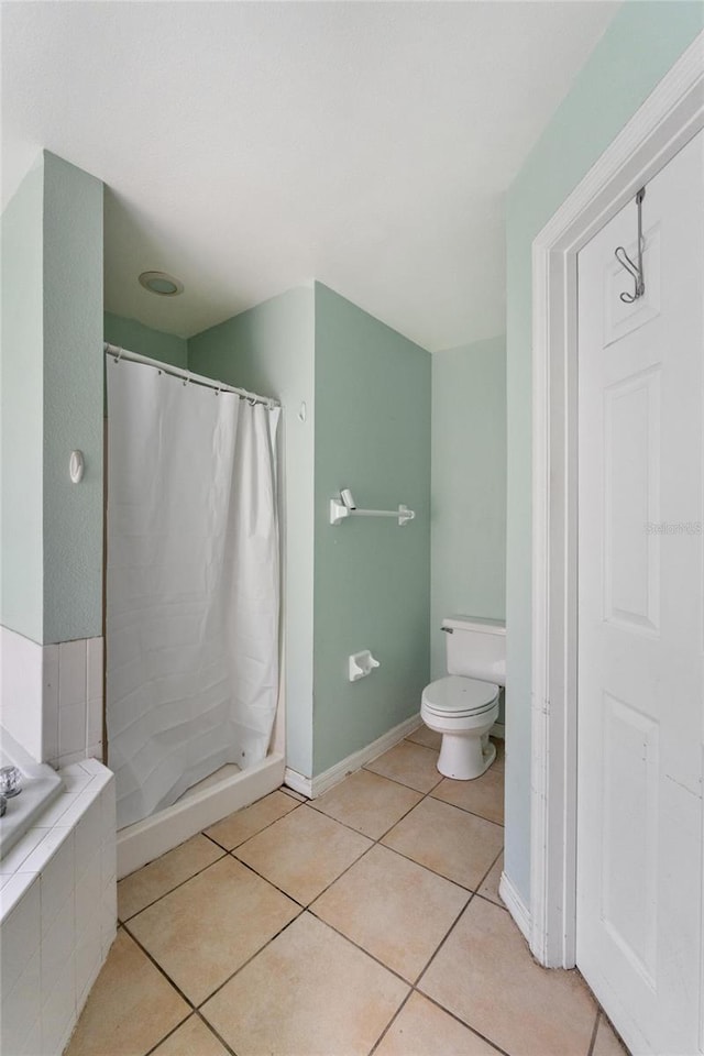 1305 Rebecca Dr, Haines City, FL 33844 - full bathroom with tile patterned floors, a shower with curtain, and a relaxing tiled tub