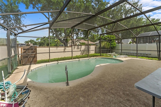 1305 Rebecca Dr, Haines City, FL 33844 - view of pool featuring a fenced backyard, a patio area, and a lanai