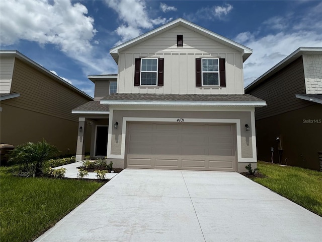4101 Sagefield Dr, Harmony, FL 34773 - view of front of home featuring driveway, an attached garage, board and batten siding, and a front yard