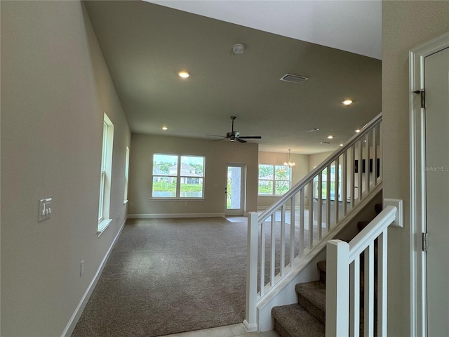 4101 Sagefield Dr, Harmony, FL 34773 - stairway with recessed lighting, carpet flooring, a ceiling fan, and a chandelier