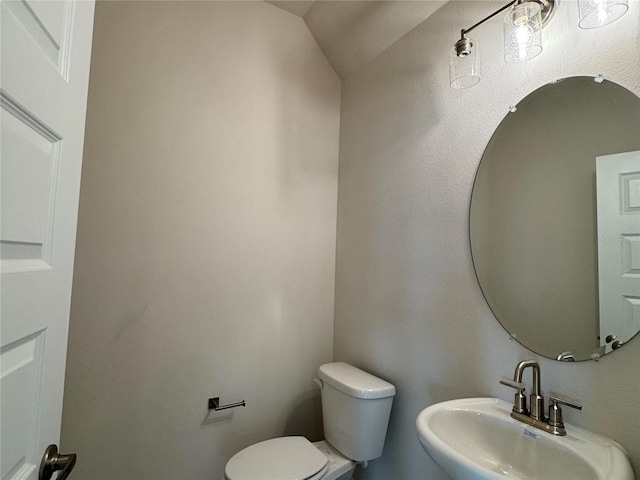 4101 Sagefield Dr, Harmony, FL 34773 - half bath featuring a sink and toilet