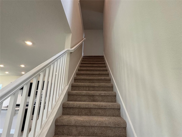 4101 Sagefield Dr, Harmony, FL 34773 - stairs with recessed lighting and baseboards