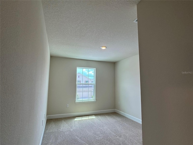 4101 Sagefield Dr, Harmony, FL 34773 - carpeted spare room with a textured ceiling and baseboards