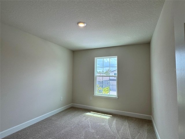 4101 Sagefield Dr, Harmony, FL 34773 - carpeted spare room with baseboards and a textured ceiling