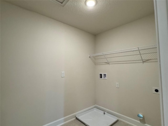 4101 Sagefield Dr, Harmony, FL 34773 - laundry area with washer hookup, hookup for an electric dryer, and a textured ceiling