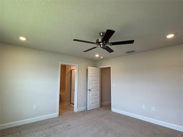 4101 Sagefield Dr, Harmony, FL 34773 - unfurnished bedroom with recessed lighting, carpet, a textured ceiling, connected bathroom, and ceiling fan