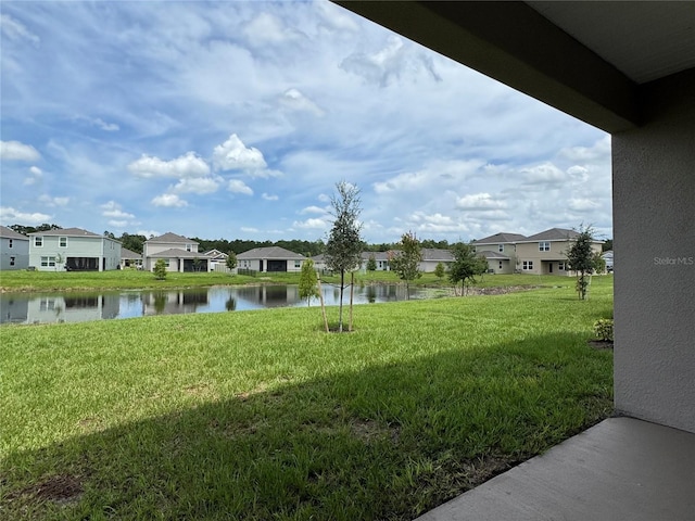 4101 Sagefield Dr, Harmony, FL 34773 - view of green lawn featuring a residential view and a water view