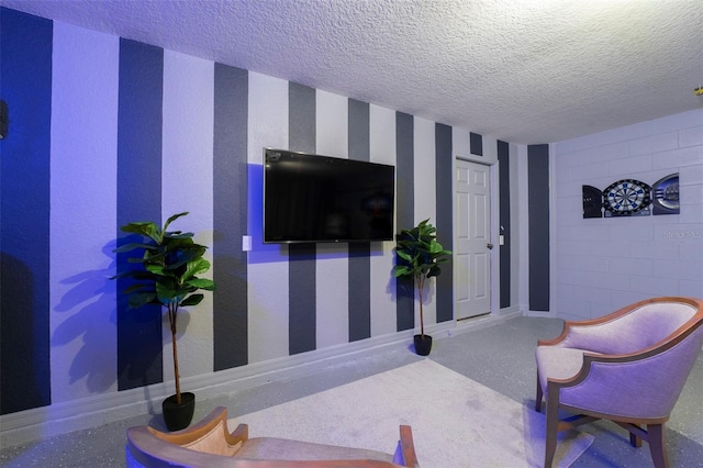 2792 Roccella Ct, Kissimmee, FL 34747 - living room with a textured ceiling and wallpapered walls